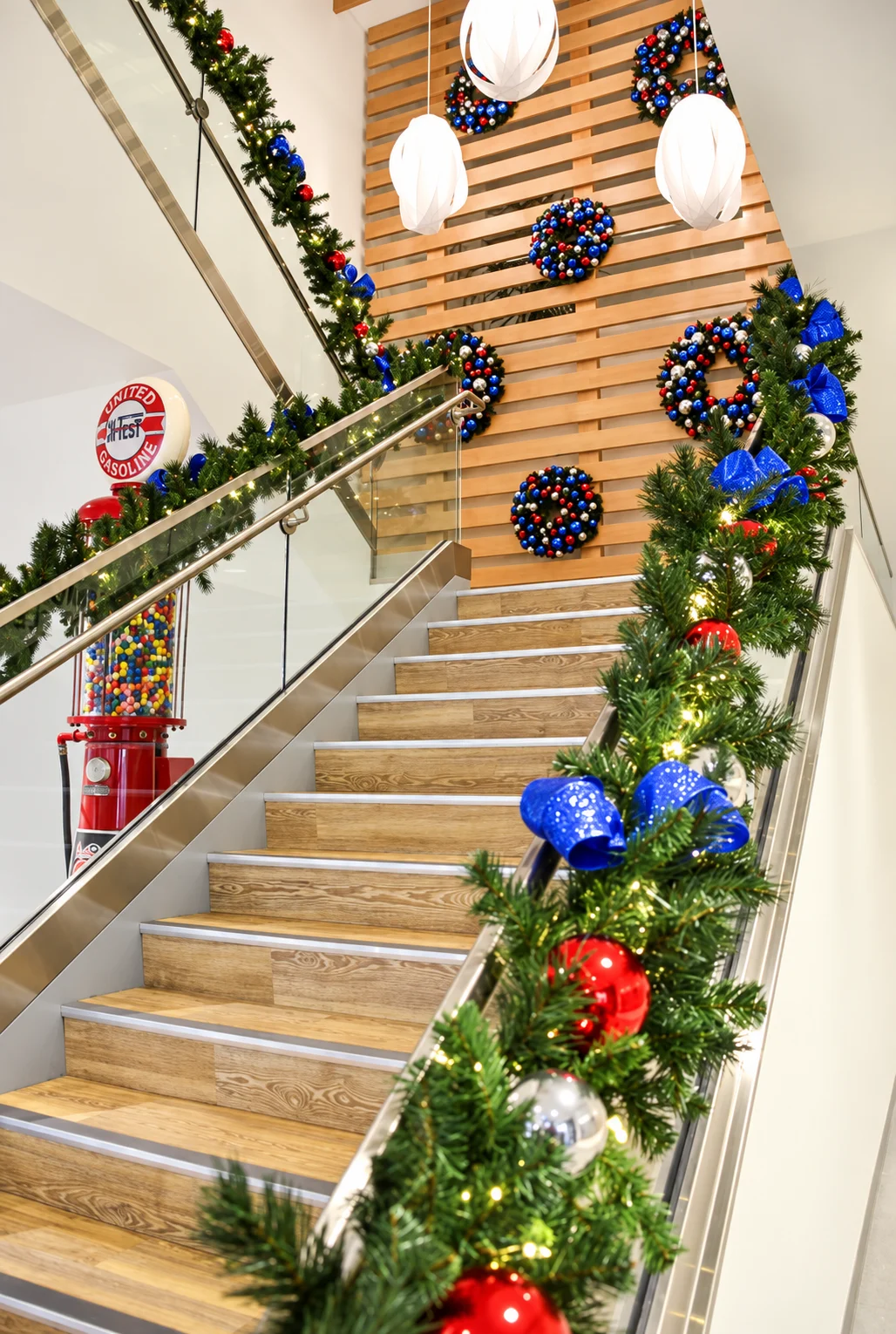 A grand staircase dressed for the holidays