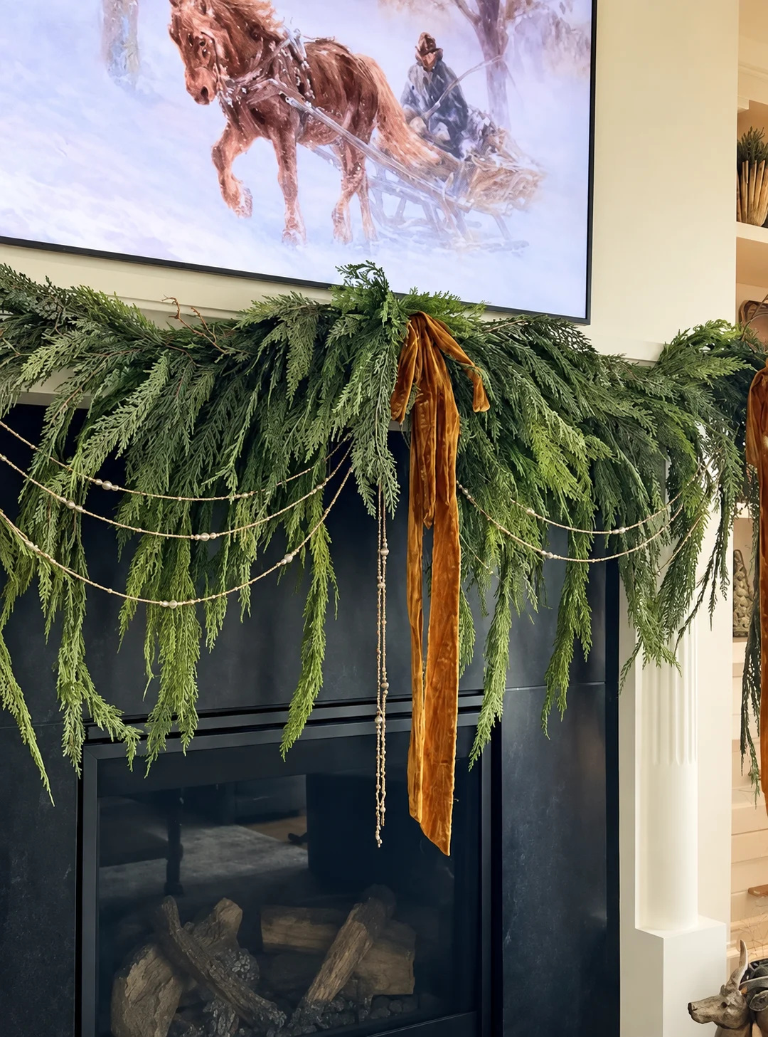 A festive fireplace and mantel display